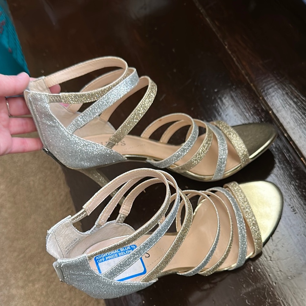 Elegant Gold and Silver Strappy Sandals by Guess